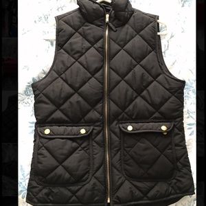 Black puffy vest