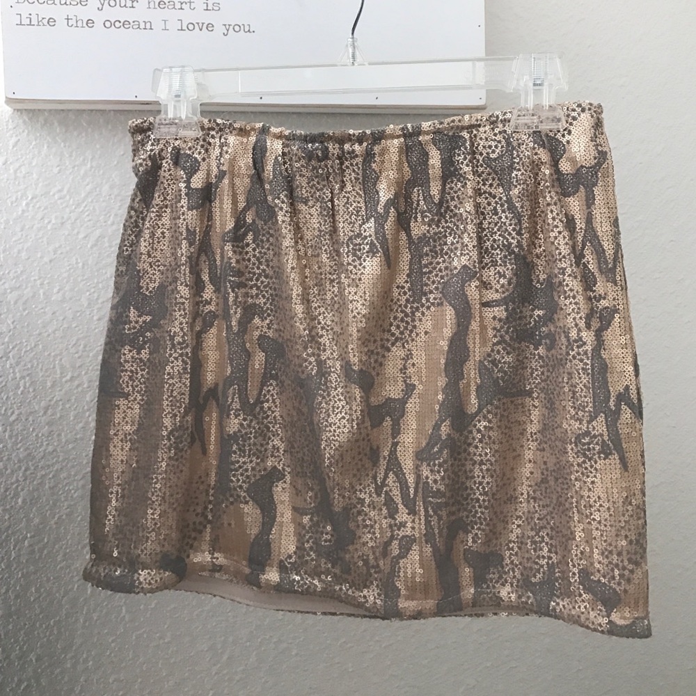 Sequin mini skirt.