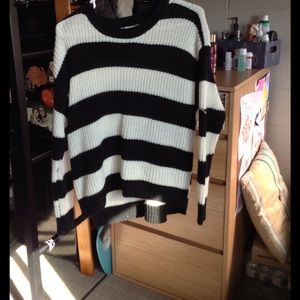 Black and white striped sweater with side zippers