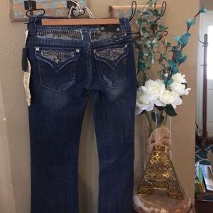 NWT Miss Me Boot cut jeans. Size 27.