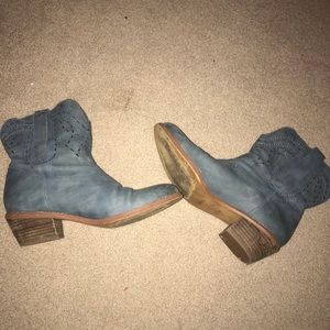 Barley worn blue GUESS cowgirl boots