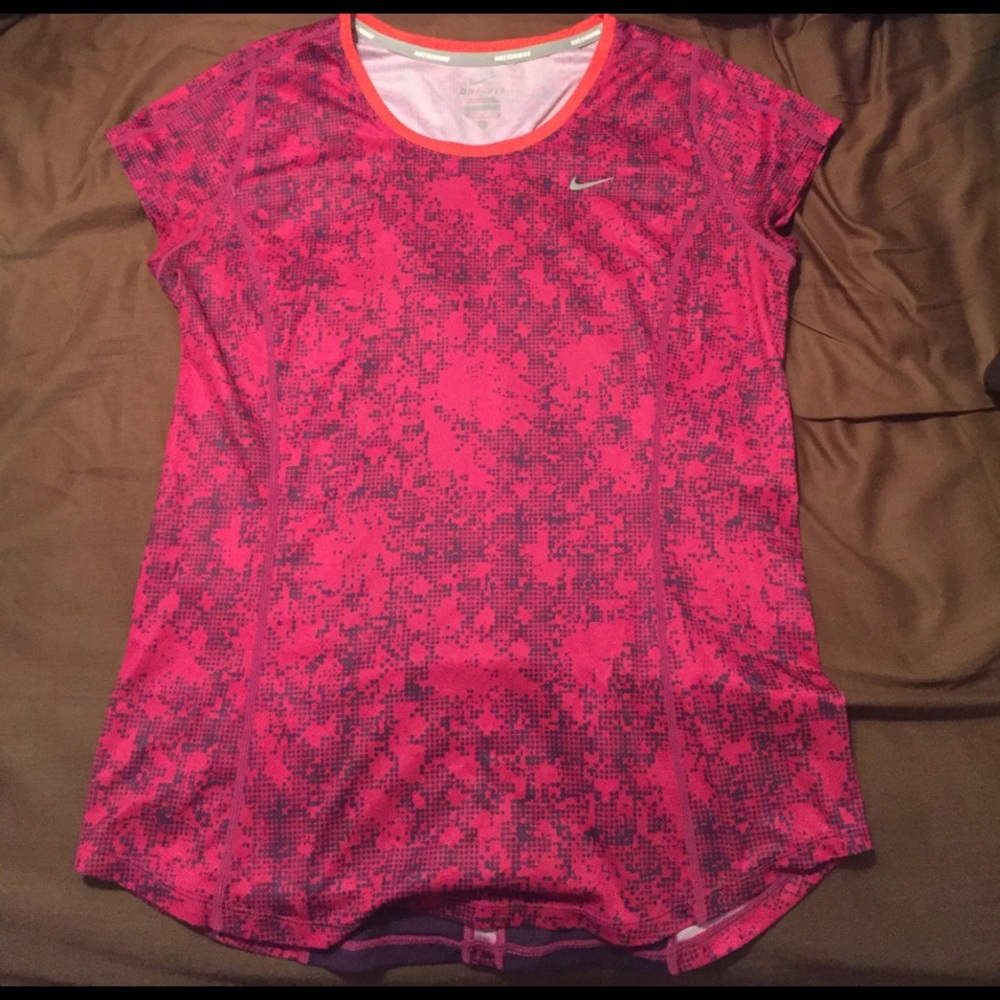 Women's Nike dry-fit running shirt. Size M