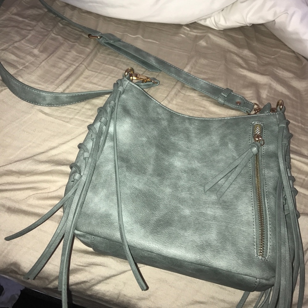 Fringe over shoulder purse
