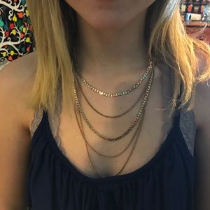 gold different length necklace