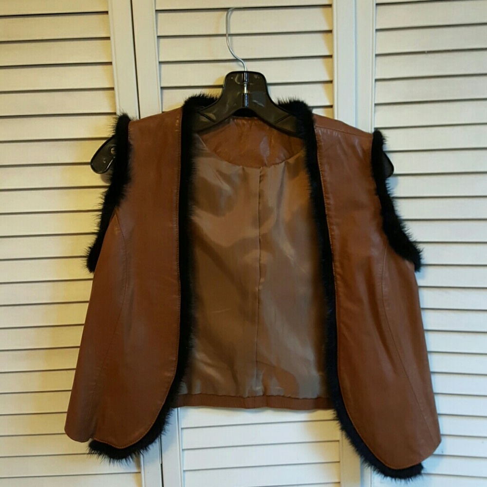 Leather vest with mink trim