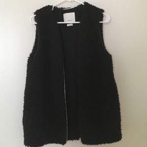 WILFRED black faux fur vest