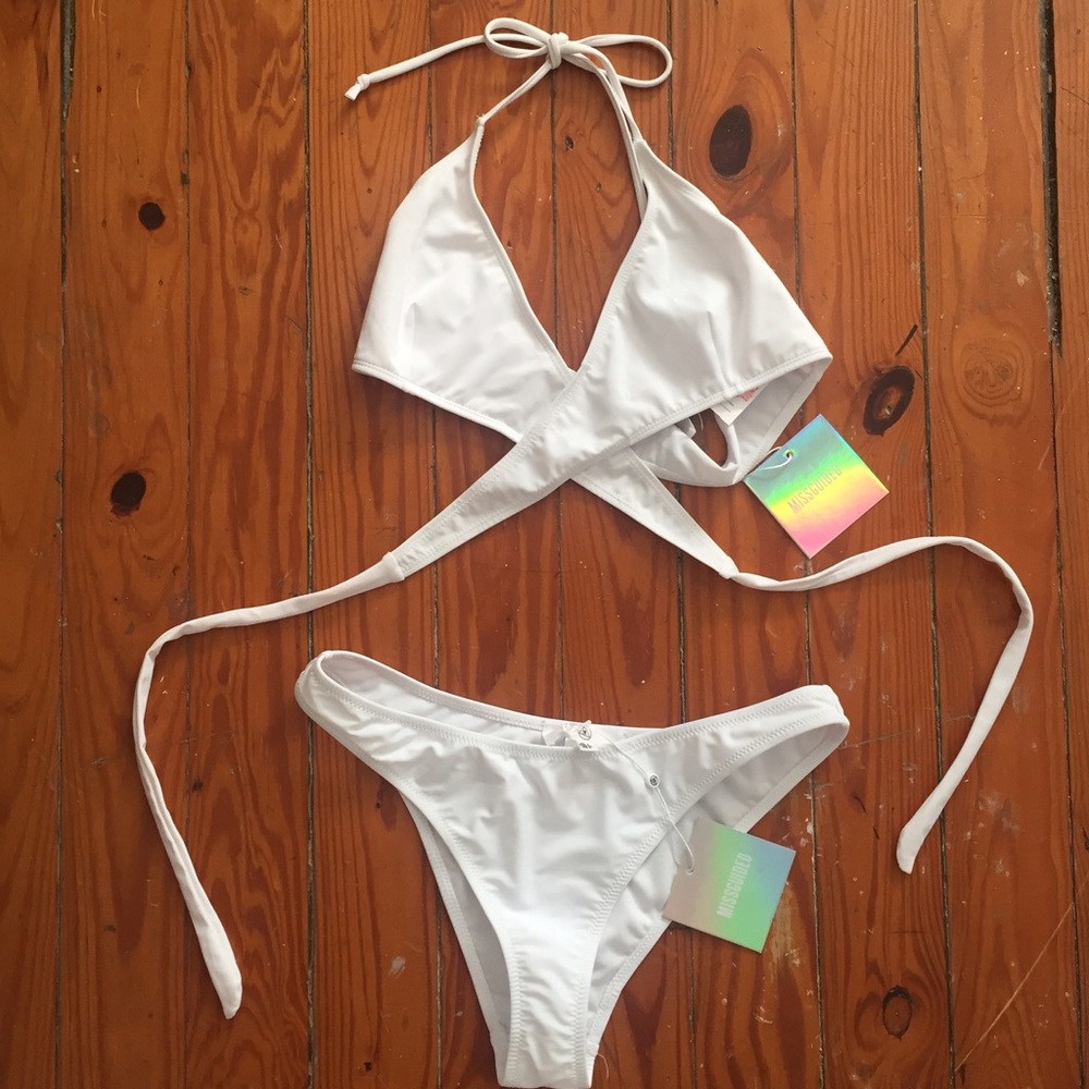 White bathing suit never worn