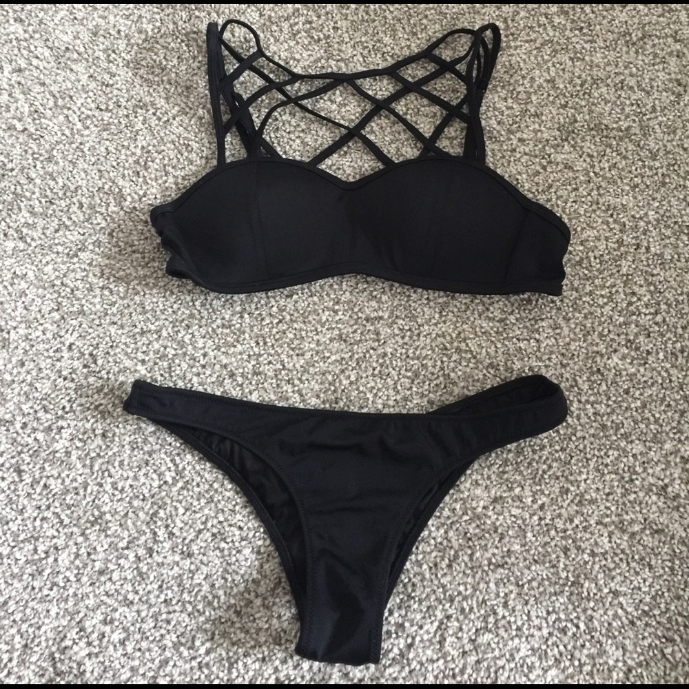 Black cage top vs pink bikini set