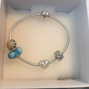 Pandora bracelet with four charms