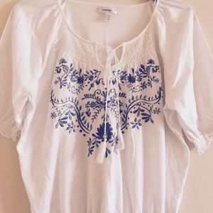 White and blue boho top with beaded tassel ties.