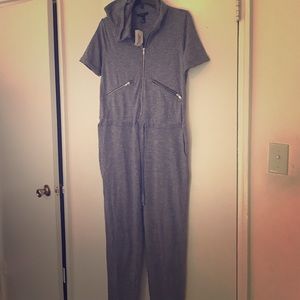 Hooded zip-front jumpsuit.