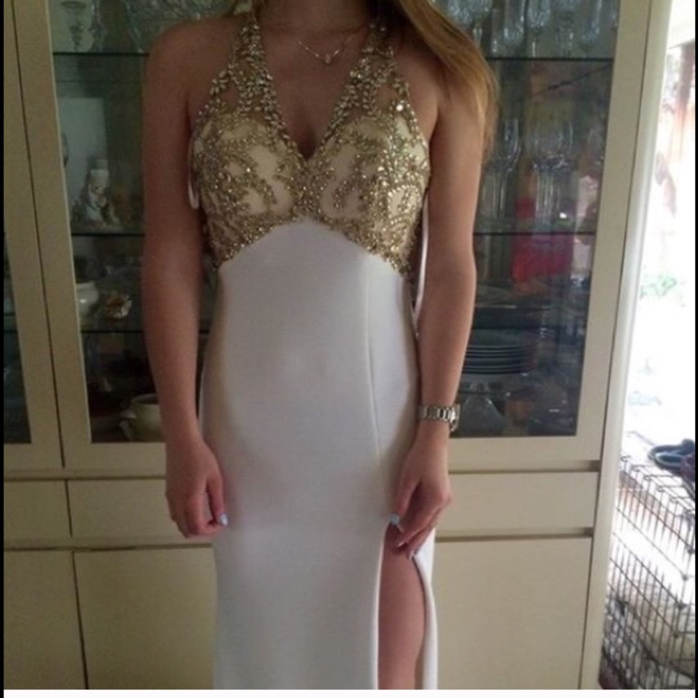 Wore to senior prom once, no longer need it