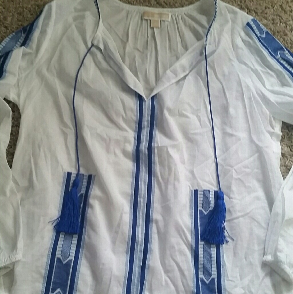 White linen top with tribal accents