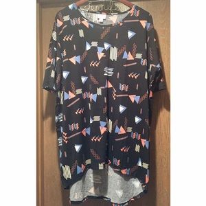 NWOT LuLaRoe Irma Top, black background