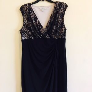 Plus size, mid length, black and cream, dress.