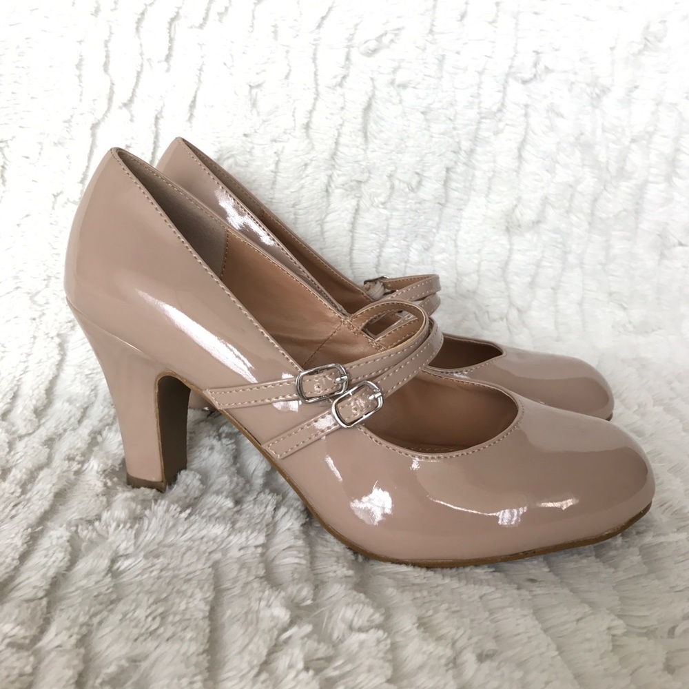 Nude patent heels.