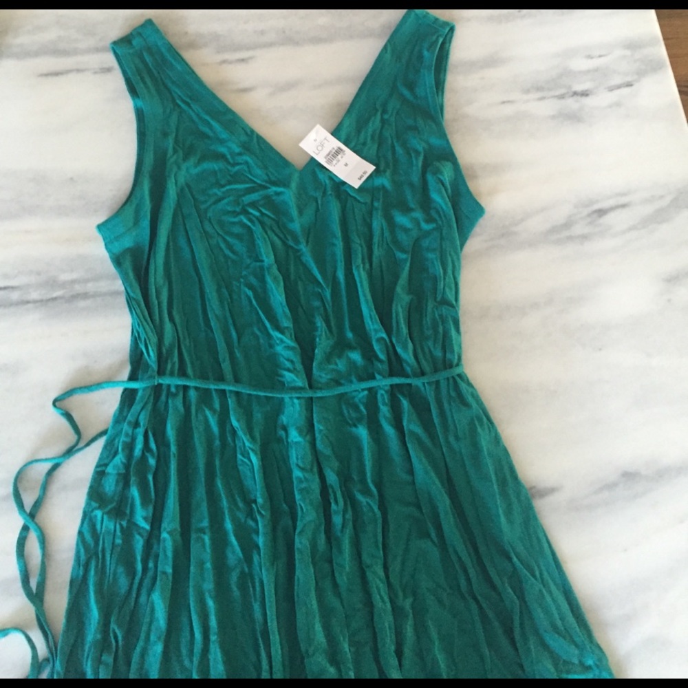 Teal green knee-length dress