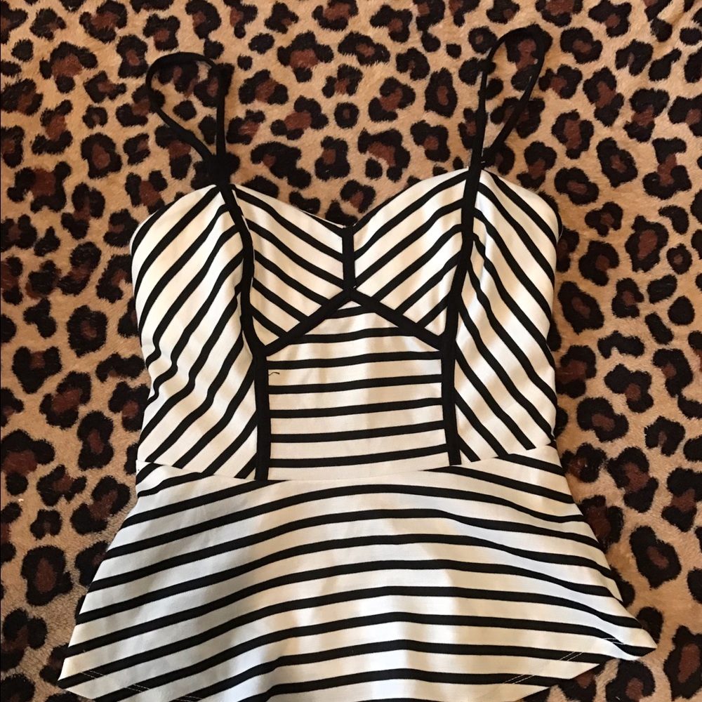 Peplum top with black adjustable straps