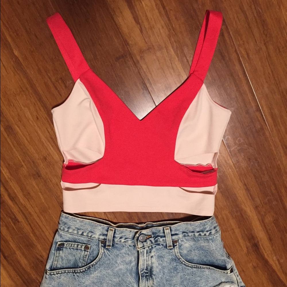 Trendy crop top with cut out sides. New!