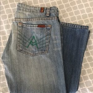 older pair of jeans, light signs of wear, no rips.