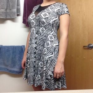 Black and white patterned dress.