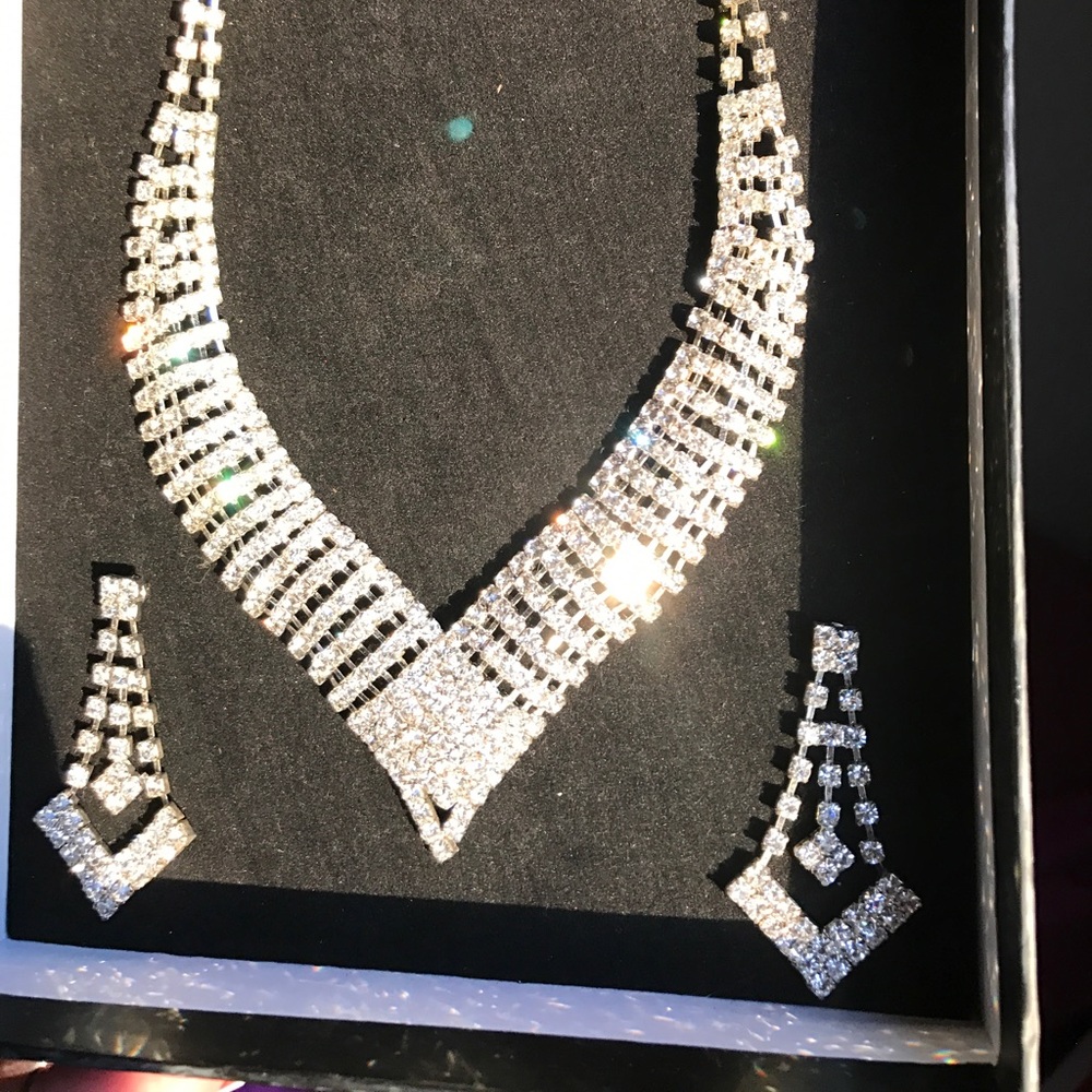 Necklace and earrings set. Worn once years ago.