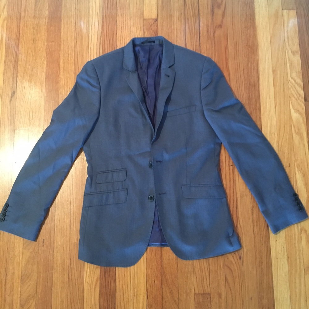 Navy blue men's slim fit ASOS suit.