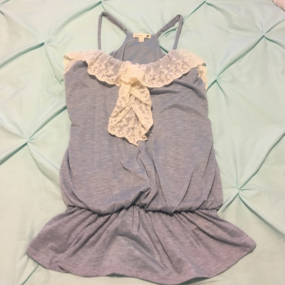 Light blue tank top with lace trim.