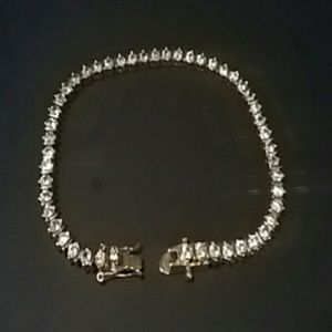 Gold tone tennis braclet