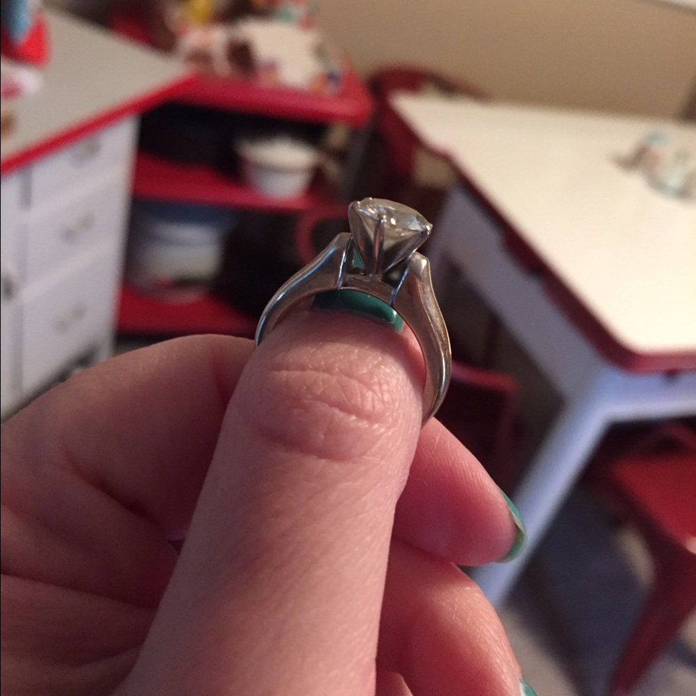 Size 5.5 Moissanite Solitaire set in White Gold