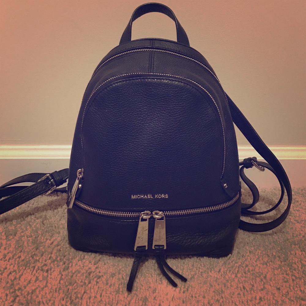 Authentic medium size Michael kors black backpack