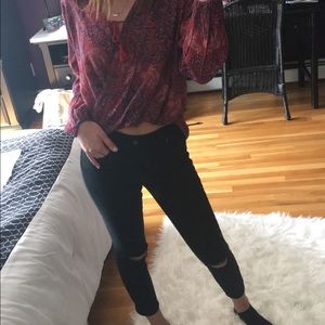 black skinny ripped knee ankle jeans