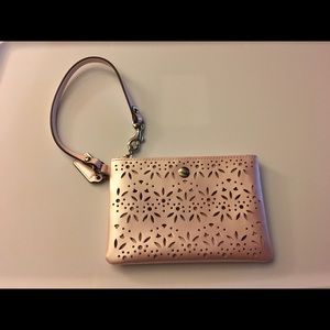 Coach Pink vinyl eyelet wristlet
