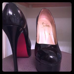 Black platform pumps