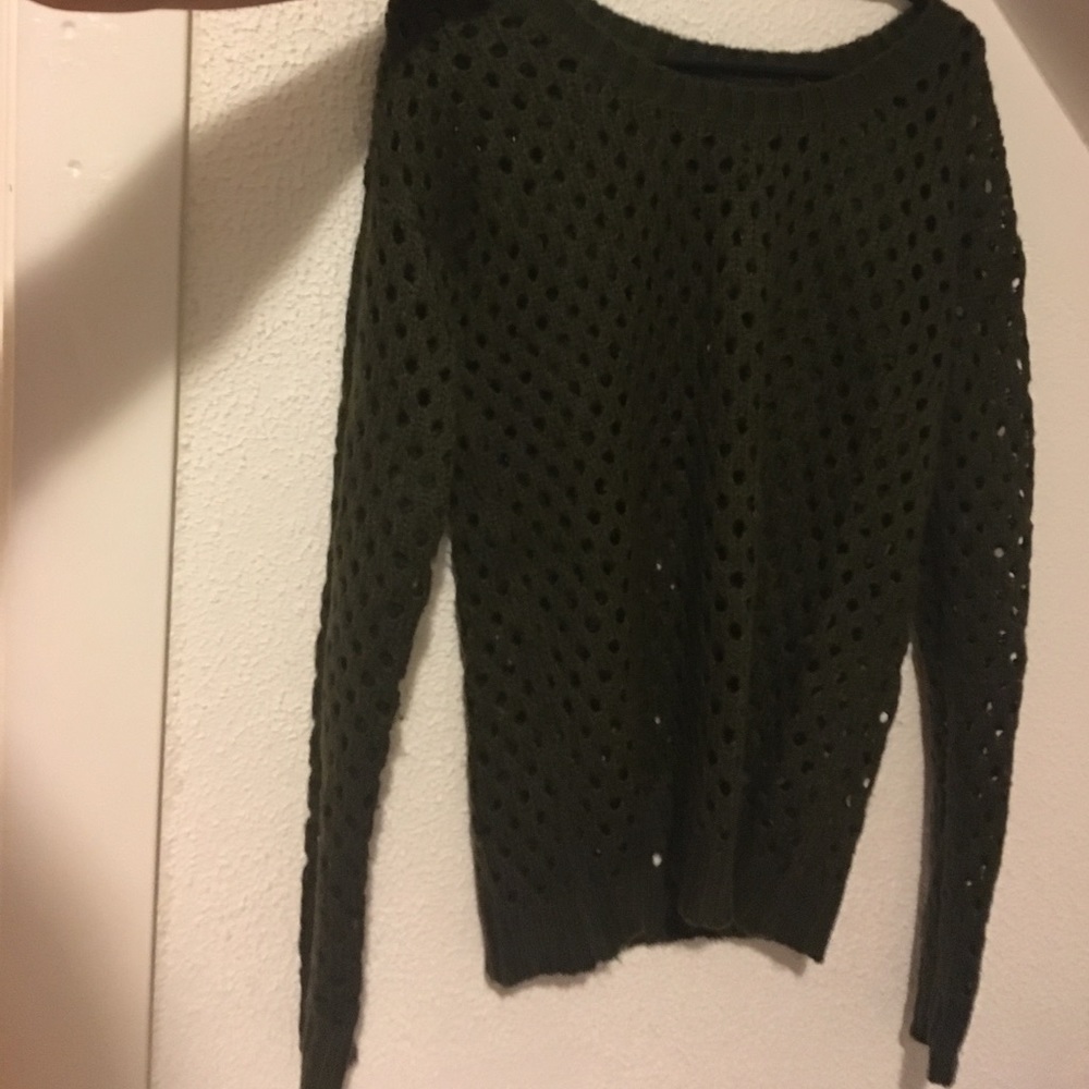 Soft sweater with holes