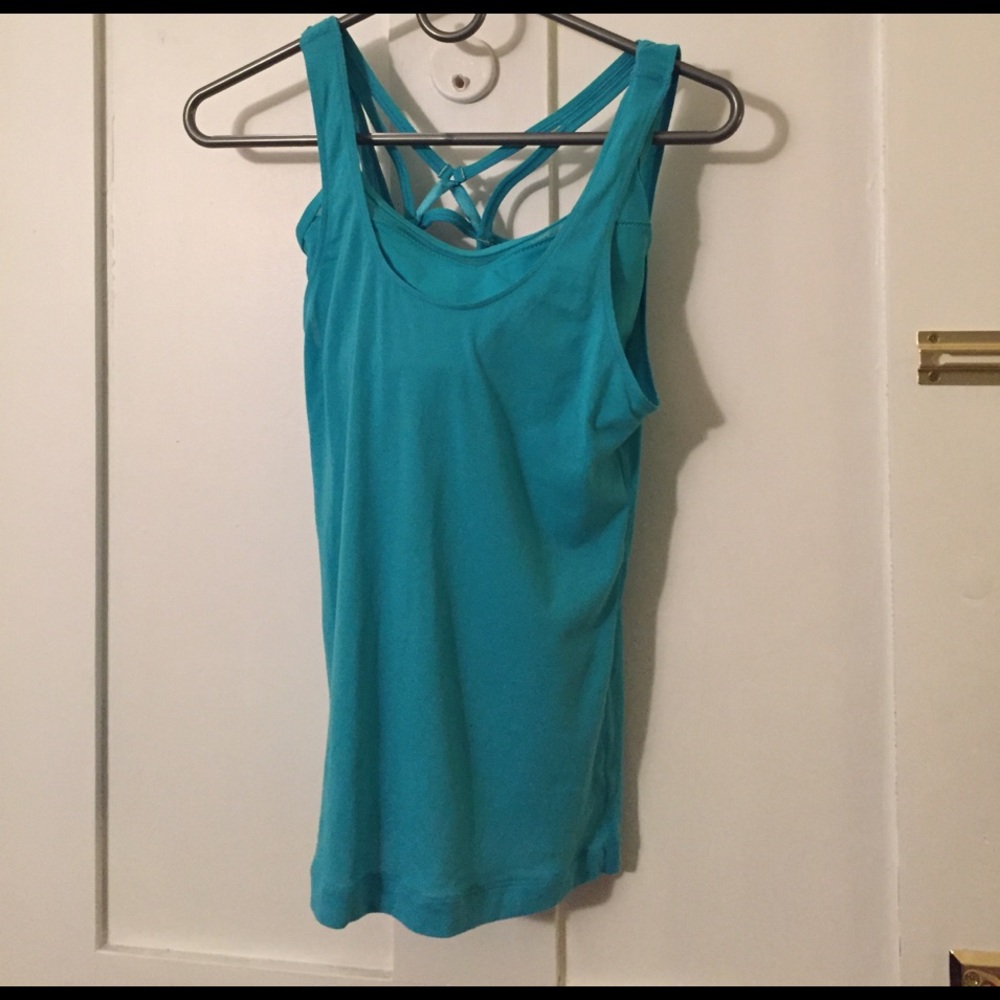 Tank top and sports bra. Never worn!