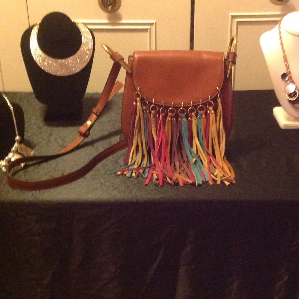Leather rust handbag w/multi-colored suede fringes