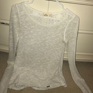 White shimmering Hollister sweater with lace back