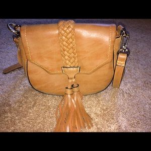 Mellow World leather Boho tassel crossbody purse.