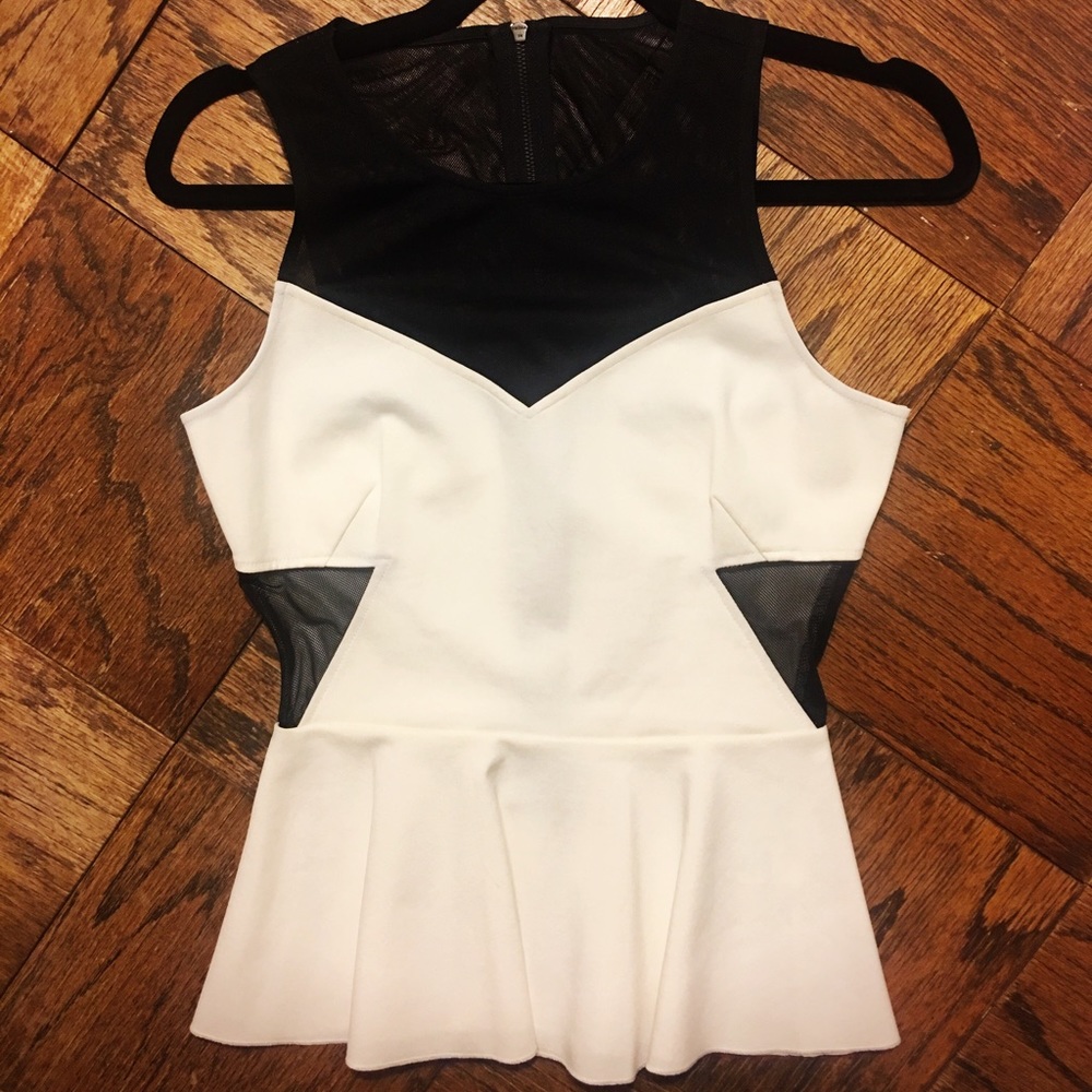 Intermix mesh cut out peplum top