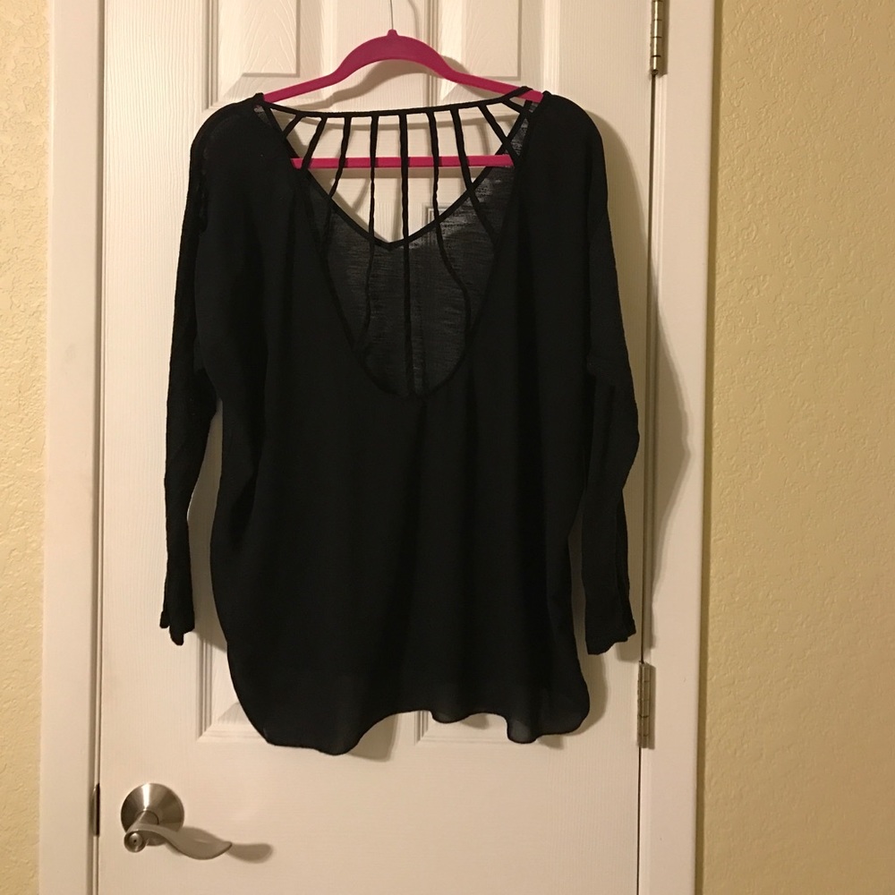 Black top with back detailing.