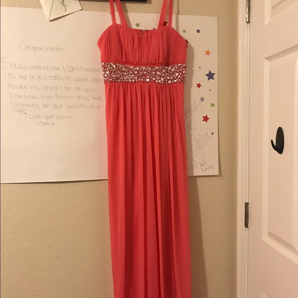 Prom dress, necklace, bracelet, and earrings.