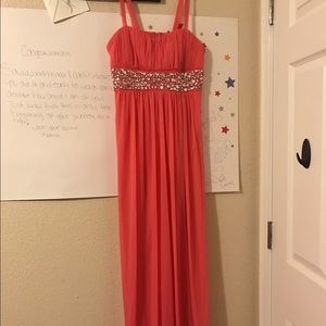 Prom dress, necklace, bracelet, and earrings.