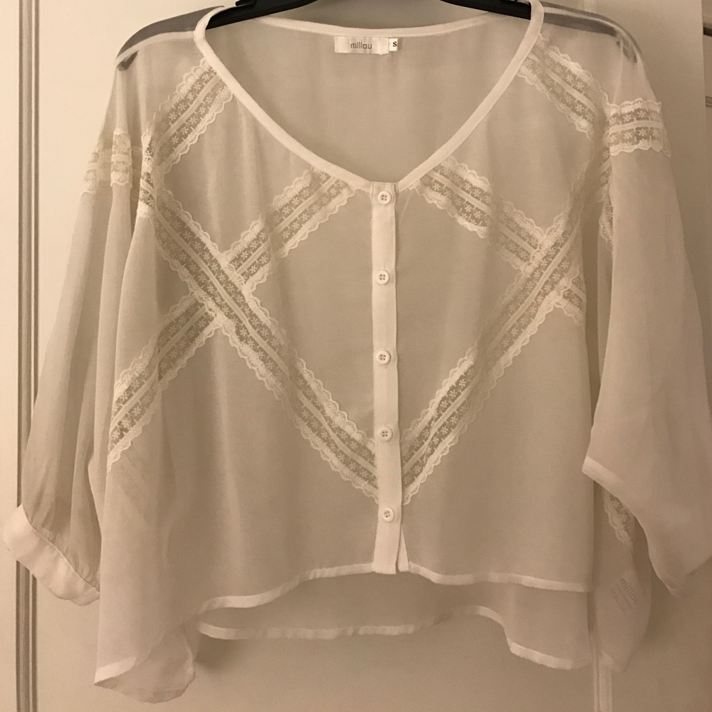 Sheer white lace blouse