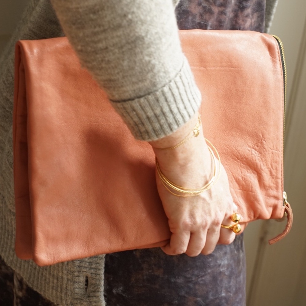 Clare Vivier dusty rose leather clutch purse.