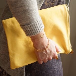 Clare Vivier yellow large leather foldover clutch