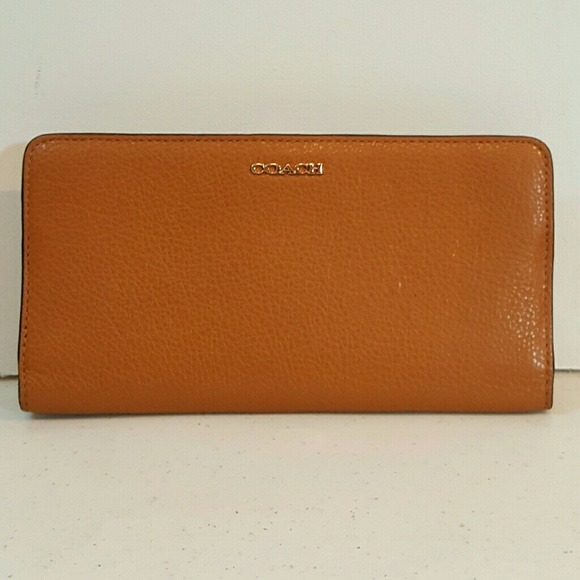 Coach Handbags - On hold for H.  coach Leather wallet