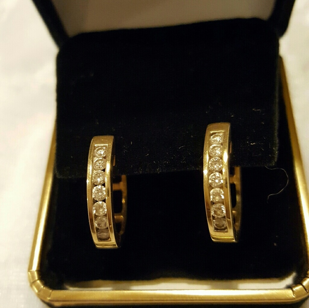 Diamond 14K gold hinged hoops. Price firm.