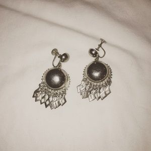 Silver costume earrings. Eclectic style.