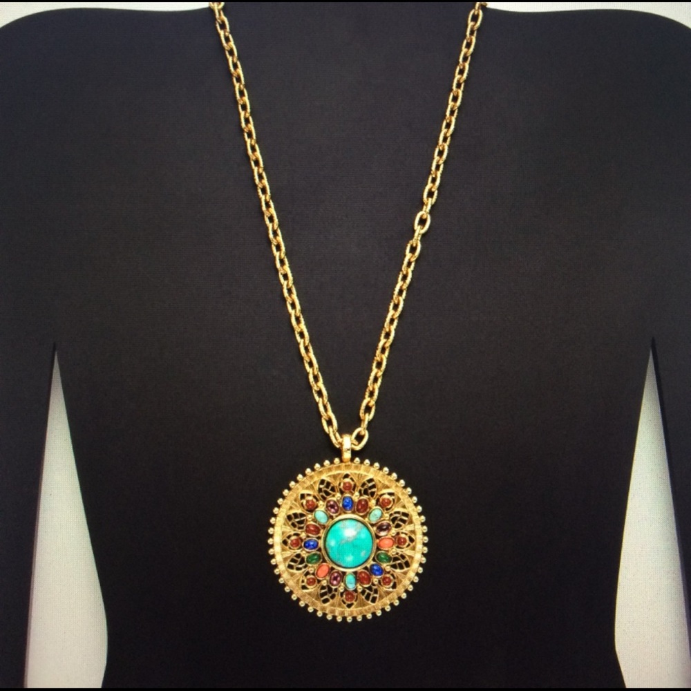 NWT - R. J. Granziano long gold floral pendant.